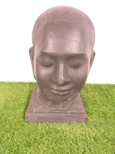 Large Stone Head on Plinth. Size H45cm NOTE: plinth has broken and will require replacement.
