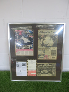 Glazed, Framed & Mounted Assorted Newspaper Cuttings of Bugatti Veyron Receiving a Parking Ticket. Size 71 x 64cm.