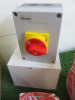 Crate Containing an Assortment of Electrical Consumables to Include: 4 x Assorted Newlec Switches, 3 x Industrial Plugs, 1 x Newlec Enclosed E Stop, 13 x MK 13A DP Switch Connection Units & 4 x Assorted MK Electrical Fittings. Crate Not Included. - 8