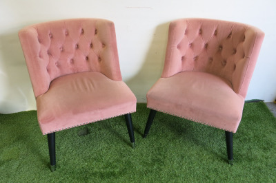 Pair of Pink Velvet Button Back Chairs with Black Legs.
