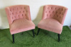 Pair of Pink Velvet Button Back Chairs with Black Legs.