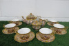 Lot of The East India Company Royal Bone China Banjarong 18ct Gold Hand Painted Crockery to Include: 1 Tea Pot, 6 x Cups with Saucers, 1 x Milk Jug & 1 x Sugar Bowl.