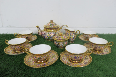 Lot of The East India Company Royal Bone China Banjarong 18ct Gold Hand Painted Crockery to Include: 1 Tea Pot, 6 x Cups with Saucers, 1 x Milk Jug & 1 x Sugar Bowl.