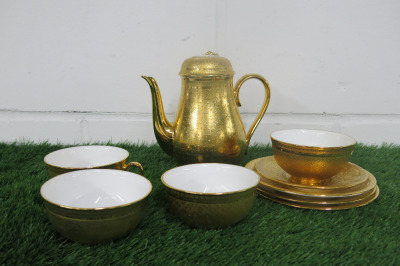 Lot of The East India Company Royal Bone China Toon Noon 18ct Gold Hand Painted Crockery to Include: 1 x Coffee Pot, 4 x Cups & 4 x Saucers. NOTE: slight damage as viewed.