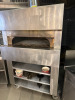 Clayburn, Clayoven Stone Based Gas Pizza Oven on Castors with 3 Shelves Under, Comes with 3 x Pizza Peels. Size H180 x W114 x D94cm.