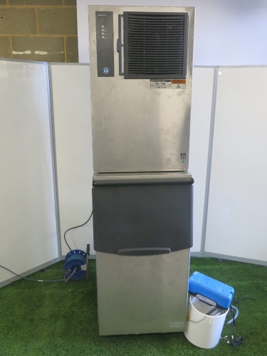 Hoshizaki Ice Machine, Model IM-240ANE-HC, S/N P32574F on Hoshizaki Ice Storage Bin, Model B-140SA. Comes with Power Lead & Sauermann Pump.
