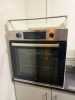 Beko BBXIF243XC Electric Stainless Steel Oven, in White Wooden Counter Top Case with Shelf.