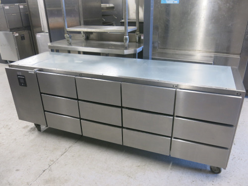 Precision 12 Draw Stainless Steel Mobile Prep Top Fridge, Model MCU411. Size H85 x W225 x 67cm.