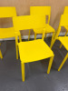 18 x IKEA Yellow Plastic Stackable Chairs. - 2