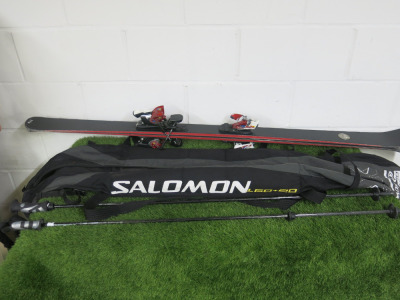 Pair of AK Ski's with Salomon 914 Bindings. Comes with a Pair of Rossignol Ski Poles & Carry Bag.