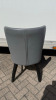 4 x Grey Faux Leather Curved Back Padded Dining Chairs on Black Wooden Frame. - 4