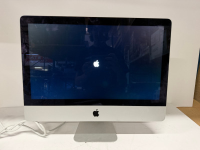 Apple iMac, 21.5" Display, 2.7GHz Quad Core Intel Core i5, with 8GB Memory.