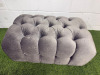 Crushed Grey Velour Upholstered Pouffe/Footstool with Button Detail. Size H38 x W83 x D50cm. - 2