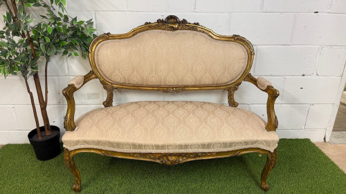 Antique French Louis XV Style Giltwood Settee in Gold Ornate Carved Wood with Soft Patterned Damask Upholstery. Size H96 x W121 x D65cm.