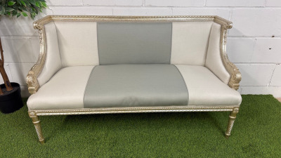 A French Louis XVI Style 2 Seater Love Seat in Ornate Antique Silver Carved Wood Frame with Two Tone Cream & Grey Upholstery. Size H75 x W126 x D52cm.