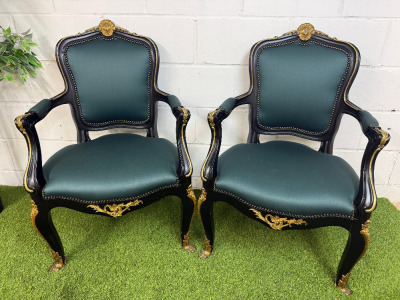 Pair of Regency Style Gilt & Black Lacquered Armchairs with Forest Green Satin Upholstery in Classic French Regency Style. NOTE: arm requires glued, missing a few nails.