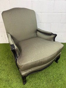 A Louis XV Style Revival Bergere Armchair in Olive Green Satin Upholstery with Black Patterned Frame with Stud Detail.