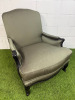 A Louis XV Style Revival Bergere Armchair in Olive Green Satin Upholstery with Black Patterned Frame with Stud Detail.