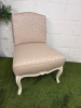 A Handcrafted 'Oficina Inglesa' French Style Armless Slipper Chair in Cream Paisley Upholstery on Off White Wood Frame.