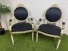 Pair of Louis XVI Style Carved Gilt Armchairs in White with Gold Painted Detail & Royal Blue Satin Upholstery with Three Rose Finial to Top.