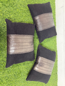 3 x de Le Cuona Black & Brown Faux Leather Feather Filled Cushions. Size 40 x 30cm.