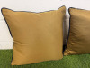 2 x Dark Gold with Black Faux Leather Trim Feather Filled Cushions. Size 50 x 50cm. - 2