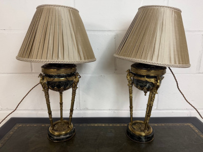 Pair of French Empire Style Tripod Oil Lamp Bases with Lamp Insert Tops. Made from Marble & Brass with Sphinx Detail Motifs. Size H55cm. NOTE: damaged & will require marble repair and some restoration.