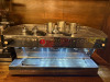 La Marzocco 3 Grp Coffee Machine, Model Linea PB 3 AV, S/N PB007489. YOM 2016. Comes with La Marzocco Water Pump, S/N 468PD & Pentair Everpure Claris XL Water Filter.