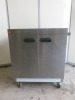 Parry Stainless Steel 2 Door Mobile Heated Cupboard, Model 1888, S/N 140001086, YOM 06/21, Size H93 x W85 x D62cm. Comes with Instruction Manual. Appears unused.