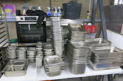 145 x Assorted Size Metal GN Containers to Include: 17 x 1/1, 31 x 1/2, 9 x 1/2 Perforated, 33 x 1/3, 24 x 1/6 & 31 x 1/9.