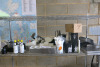 Large Quantity of Bar Accessories to Include: Serving Trays, Ice Scoops, Bar Tidy's, Cocktail Shakers, Rubber Mats, Metal Drip Trays, Boxes of Cocktail Paper Straws, Sieves, Stoppers, Measures, Stirrers, Tongs, 3 x Bottles of Angostura Bitters, 2 x Funki