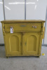 Shabby Chic Mustard Painted Wooden 2 Door 1 Drawer Cabinet, Size H103 x W100 x D45cm. NOTE: damage to back panel.