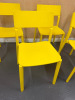 18 x IKEA Yellow Plastic Stackable Chairs. - 2