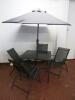 Outdoor Garden Patio Set in Dark Grey Metal. 1 x Table with Tempered Metal Glass Top, 4 x Folding Chairs & 1 x Wind Out Umbrella. Table Size H70cm x W90cm x D90cm