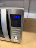 Sharp Chrome Microwave Oven, Model R-322STM. - 2