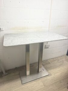 Marble Top Rectangular High Table on Stainless Steel Twin Pedestal Base, Size H110 x W120 x D70cm.