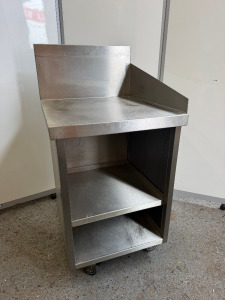 Mobile Stainless Steel Table with 2 Shelves Under & Backsplash. Size H85 x W58 x D65cm.