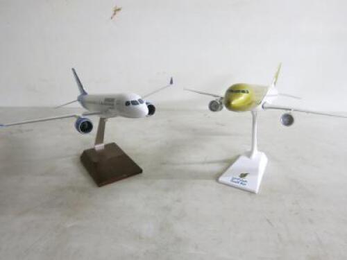 2 x Smaller Model Airplanes, Gulfair & Bombadier (Note: missing tail wing on each). Size 35cm Wingspan x 34cm Fuselage
