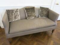 2 Seater Sofa Upholstered in Grey Fabric with Stud Detail on Wooden Legs & Castors with 3 Crushed Velour Scatter Cushions. H75cm x W 155cm x D70cm. NOTE: Stain on seat requires cleaning