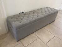 Grey Upholstered Button Topped Ottoman. Size H42cm x W160cm x D47cm. NOTE: Requires cleaning