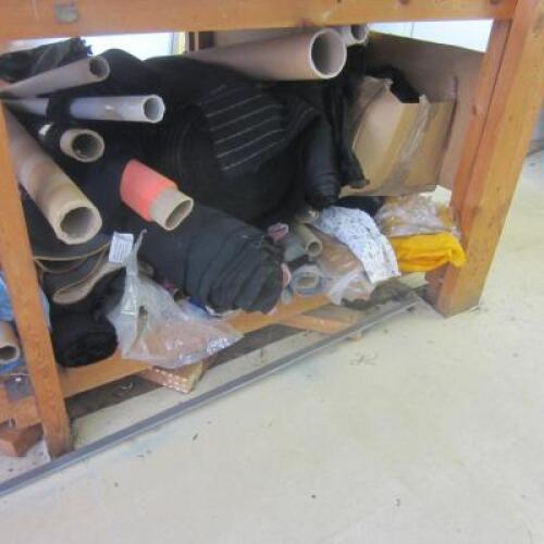 Approx 60 Rolls & Part Rolls of Assorted Length, Width & Type of Material. Located under cutting table (As Viewed/Pictured)