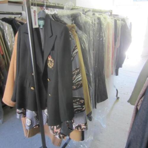 Cloths Rail Containing 150 x Items of Clothing Including Coats, Trousers, Blouses (As Viewed)