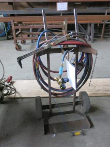 Pair of Oxy Acetylene Welding Bottle Gauges with Hoses and Cutting Torch. Comes with Bottle Trolley