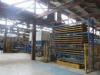 Structural Insulated Panel (SIP) Laminating Bonding Line by Laminating Technology Type 2KAS, S/N RFB-6058, Year 2003.Complete Line with Pick & Place Pallet Loader, Motorised & Manual Rollers feedswith Quantity of Yellow Steel Pallets.Total Line Measures 9 - 3