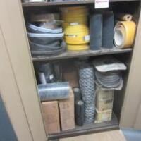 Stationary Cabinet Containing Rolls of Flashing, Lead and Other Edge Sealing Tape Flashings (As Viewed)