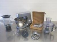 Kenwood Chef Elite Mixer, Model KVC51. Comes with 3 Mixing Attachments, Glass Blender, Food Mixer & 6 x New Boxed Slicing/Grating & Chopping Blades. NOTE: Missing Blender Top