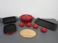 9 x Items of Assorted Staub Cookware to Include: 1 x Oval La Cocotte Pot (113/8), 1 x Cast Iron Roasting Tin, 1 x Cast Iron La Plancha Hot Plate, 4 x La Cocotte (37/8), 1 x Cast Iron Griddle & 1 x Magnetic Oval Trivet
