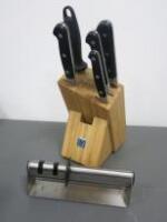 Set of 4 Zwilling Professional Kitchen Knives. Comes with Knife Steel, Knife Sharpener & Zwilling Wooden Knife Block.