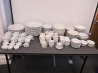 Approx 175 x Items of White Crockery to Include: Dinner Plates, Side Plates, Oval Dinner Plates, Bowls, Saucers, Tea Cups, Coffee Cups, Serving Dishes & Ramekins (As Pictured/Viewed)