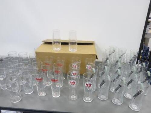 72 x Assorted Branded/Unbranded 1 Pt Glasses to Include: 22 x Carlsberg Export, 21 x Tuborg, 7 x Guinness, 6 x Mahou, 5 x Hop House & 11 x Unbranded